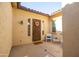 Cozy front porch featuring a wreath, welcome mat, and seating area at 19598 E Walnut Rd, Queen Creek, AZ 85142
