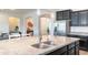 Gourmet kitchen featuring granite countertops and stainless steel sink at 19598 E Walnut Rd, Queen Creek, AZ 85142