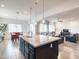 Modern eat-in kitchen with large island and stainless steel appliances at 19598 E Walnut Rd, Queen Creek, AZ 85142