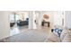 Open-concept living room featuring neutral colors and plenty of natural light at 19598 E Walnut Rd, Queen Creek, AZ 85142