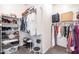 Spacious walk-in closet with ample shelving and hanging space for organized storage at 19598 E Walnut Rd, Queen Creek, AZ 85142