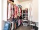Large walk-in closet featuring shelving and storage options, perfect for organization at 19598 E Walnut Rd, Queen Creek, AZ 85142