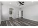 Main bedroom featuring an ensuite bathroom and gray vinyl floors at 20919 E Desert Hills Blvd, Queen Creek, AZ 85142