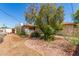 Charming front yard with landscaping, featuring native bushes and rock accents at 2138 W Northview Ave, Phoenix, AZ 85021