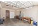 Spacious garage with work bench, peg board, and storage cabinets at 2138 W Northview Ave, Phoenix, AZ 85021