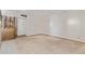 Living room with carpet, wood accents and open access to an adjacent room at 2138 W Northview Ave, Phoenix, AZ 85021