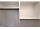 Bright closet with shelving and black hardware for hanging clothes and storage at 2859 E Los Altos Rd, Gilbert, AZ 85297