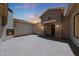 Charming courtyard with a fireplace and brick pavers, perfect for outdoor entertaining at 2859 E Los Altos Rd, Gilbert, AZ 85297