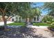 Charming single-story home featuring lush landscaping and a well-manicured lawn at 2859 E Los Altos Rd, Gilbert, AZ 85297