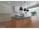 Beautiful kitchen island with quartz countertops and ample prep space at 2859 E Los Altos Rd, Gilbert, AZ 85297