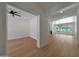 Bright and airy living space with hardwood floors and a view of the backyard at 2859 E Los Altos Rd, Gilbert, AZ 85297