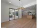 Open floor plan showcasing an entertainment area, kitchen, and dining space at 2859 E Los Altos Rd, Gilbert, AZ 85297