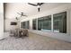 Covered patio with tile flooring, ceiling fans, and views of the pool at 2859 E Los Altos Rd, Gilbert, AZ 85297