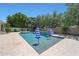 Inviting pool featuring blue and white striped umbrellas and a tranquil spa at 2859 E Los Altos Rd, Gilbert, AZ 85297