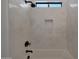 Modern shower featuring subway tile, a black rainfall showerhead, and a convenient recessed niche at 2859 E Los Altos Rd, Gilbert, AZ 85297