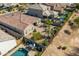 Aerial view of home, backyard, pool, and landscaping at 36130 N Quiros Dr, Queen Creek, AZ 85143