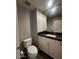 Updated bathroom with modern fixtures and tiled floor at 3935 E Rough Rider Rd # 1282, Phoenix, AZ 85050