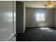 Bright bedroom with ceiling fan and a window offering natural light at 3935 E Rough Rider Rd # 1282, Phoenix, AZ 85050
