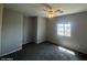 Bright bedroom with ceiling fan and a window offering natural light at 3935 E Rough Rider Rd # 1282, Phoenix, AZ 85050