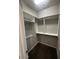 Walk-in closet with custom shelving for optimal storage at 3935 E Rough Rider Rd # 1282, Phoenix, AZ 85050