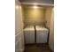 Laundry room features tiled flooring and includes washer and dryer at 3935 E Rough Rider Rd # 1282, Phoenix, AZ 85050