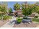 Beautiful single-Gathering home featuring a well-manicured lawn and mature trees in a desirable neighborhood at 3955 E Fox Cir, Mesa, AZ 85205