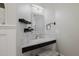 Bathroom vanity featuring marble countertop, a decorative mirror, and modern accents at 3955 E Fox Cir, Mesa, AZ 85205