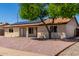 Charming single-story home featuring a low maintenance yard and solar panels at 4134 W Camino Acequia --, Phoenix, AZ 85051