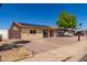 Charming single-story home featuring a low maintenance yard and solar panels at 4134 W Camino Acequia --, Phoenix, AZ 85051