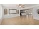 Spacious living area with tile flooring, decorative wall trim and an open floorplan at 4134 W Camino Acequia --, Phoenix, AZ 85051