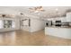 Spacious living area with tile flooring, open floorplan and adjacent kitchen area at 4134 W Camino Acequia --, Phoenix, AZ 85051