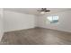 Bright and open living space offers recessed lighting, neutral walls, and wood-look tile flooring at 4134 W Camino Acequia --, Phoenix, AZ 85051