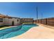 This backyard includes a pool and covered patio for relaxing outdoors at 4134 W Camino Acequia --, Phoenix, AZ 85051