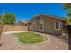 A private backyard featuring a hardscape area, desert landscape and exterior of home at 4241 E Bonanza Rd, Gilbert, AZ 85297