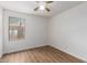 Bright bedroom with a window and wood-look floors, perfect for relaxation at 4241 E Bonanza Rd, Gilbert, AZ 85297