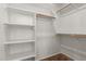 Walk-in closet with shelves and rods at 4241 E Bonanza Rd, Gilbert, AZ 85297