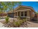 Single-story home with desert landscaping and a convenient two-car garage at 4241 E Bonanza Rd, Gilbert, AZ 85297