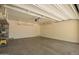 Spacious garage with overhead storage, providing ample room for vehicles and belongings at 4241 E Bonanza Rd, Gilbert, AZ 85297