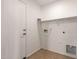 This laundry room features tile floors and space for appliances at 4241 E Bonanza Rd, Gilbert, AZ 85297