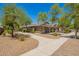 Exterior corner lot featuring a sidewalk with desert landscaping and a single-story house at 4241 E Bonanza Rd, Gilbert, AZ 85297
