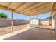 Spacious covered patio overlooking the backyard and additional storage sheds at 4553 N 54Th Ave, Phoenix, AZ 85031
