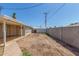 Wide shot of backyard with small covered patio and storage structure at 4553 N 54Th Ave, Phoenix, AZ 85031