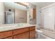 Bathroom featuring a vanity with sink and a shower/tub combo at 4553 N 54Th Ave, Phoenix, AZ 85031