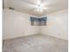 Bedroom with carpet flooring, ceiling fan, and a window with blinds at 4553 N 54Th Ave, Phoenix, AZ 85031