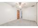 Bedroom with ceiling fan and doorway to adjacent room at 4553 N 54Th Ave, Phoenix, AZ 85031
