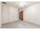 Bedroom with carpet, a ceiling fan, and closet at 4553 N 54Th Ave, Phoenix, AZ 85031