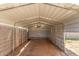 Metal carport structure with open frame and concrete slab flooring at 4553 N 54Th Ave, Phoenix, AZ 85031