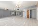 Spacious living room with tile floors, ceiling fans, and lots of natural light at 4553 N 54Th Ave, Phoenix, AZ 85031