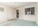 Enclosed patio with door leading to kitchen and security door to the exterior at 4553 N 54Th Ave, Phoenix, AZ 85031