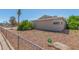Exterior view of the house showing neutral exterior and low-maintenance landscaping at 4553 N 54Th Ave, Phoenix, AZ 85031